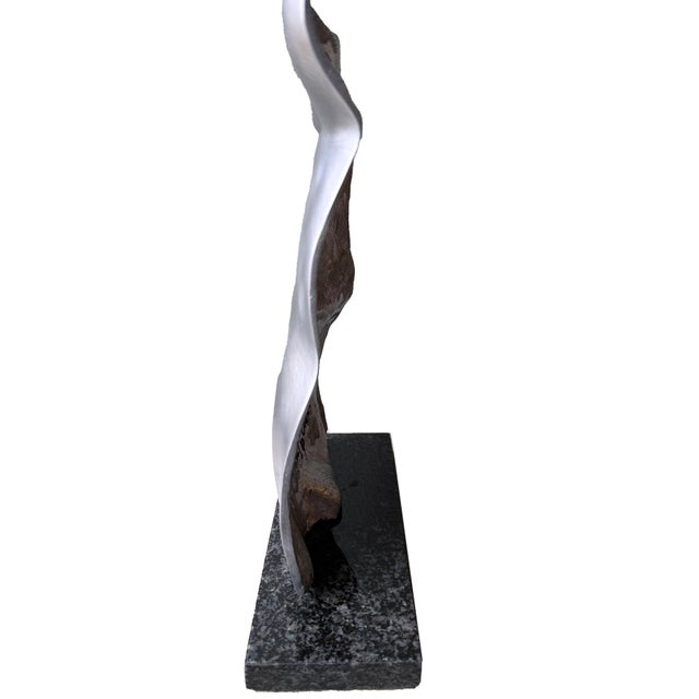 Torso Aluminum Softly, a classic motif, as pleasing today as it was in Greco-Roman time. This cast aluminum grey torso...