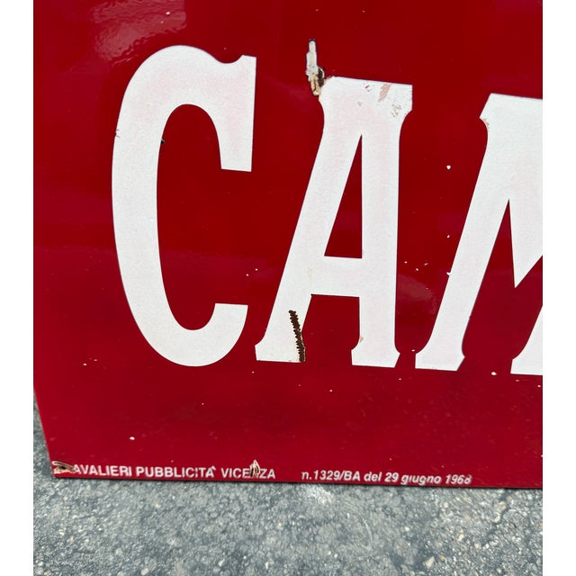 Old Campari sign from the 1960s in red enamelled iron with small signs of wear due to the passage of time This piece has...