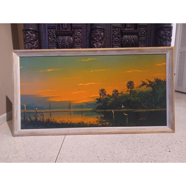 Vintage framed oil Florida painting by Sam Newton. This oil painting is done by Original Highwayman Sam Newton depicting a...