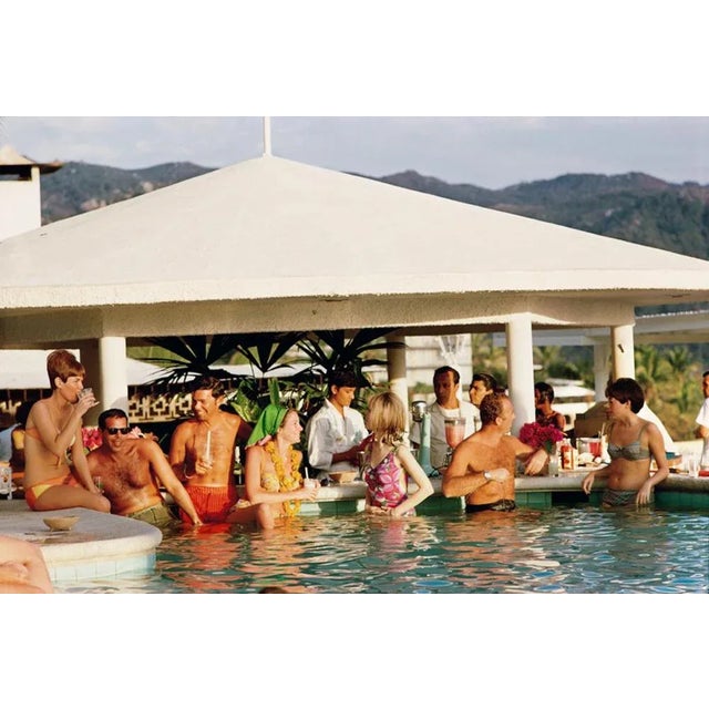Racquet Club Pool 1968 by Slim Aarons Slim Aarons Limited Estate Edition Guests in the pool at the Villa Vera Racquet...