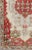Measures: 4'4 x 7'9 This vintage Turkish Oushak rug features an intricate geometric medallion design. The central...
