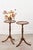 This pair of scalloped octagonal mahogany wine tables feature finely turned and fluted pedestals that taper into tripod...