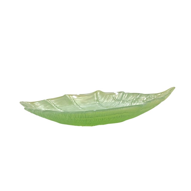 Vintage pressed glass serving bowl in a shell form with a celery green iridescent flash finish. This piece features...