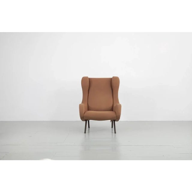 This "Senior" armchair was designed by Marco Zanuso in the 1950s. The elegant armchair was sold under the Arflex label. I...
