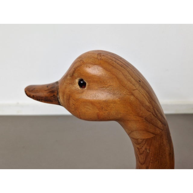 This Canadian carved goose from pine wood is also known as a decoy goose, but this extremely life like example was made...
