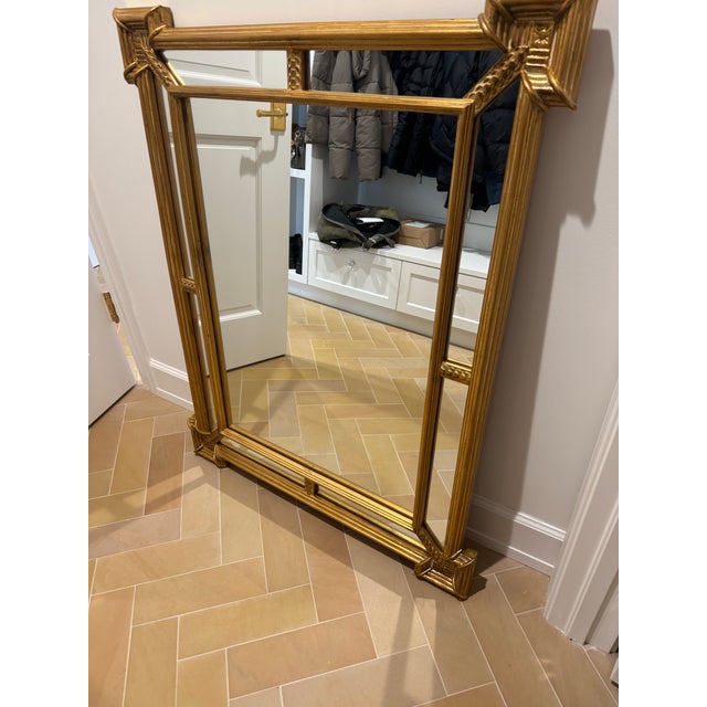 An architectural vintage Carvers’ Guild “Quatrain” mirror, produced in 1990 in West Groton, Massachusetts. This example...