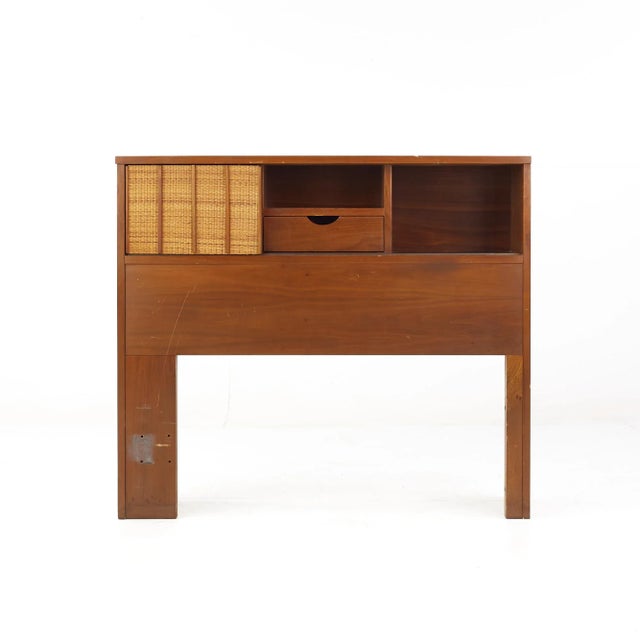 Mainline by Hooker Mid Century Walnut and Cane Twin Storage Headboard This headboard measures: 41 wide x 10 deep x 36...