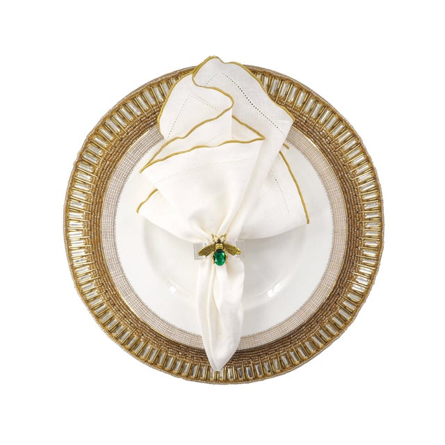 Add a touch of timeless elegance to your dining experience with our Linen Napkins with Gold Ruffled Hemstitch Edges, a set...