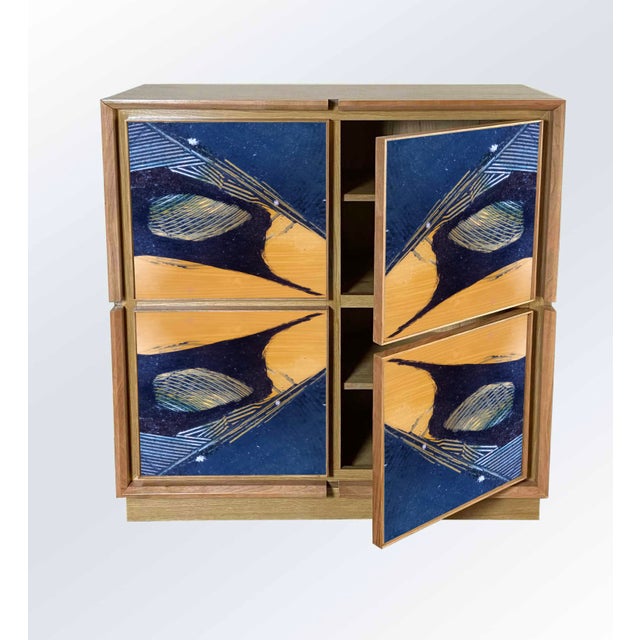 "Disegno Nove" 2026 sideboard by Meccani Studio for Meccani Design. A beautiful oak sideboard with cherry and walnut...