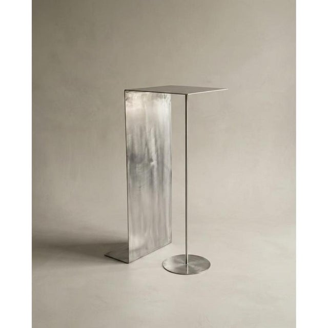 Tacco Cocktail Table in Stainless Steel by Metalmorphosis Studio Dimensions: D 45 x W 45 x H 110 cm. Materials: Stainless...