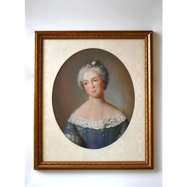 An eighteenth-century, c. 1750 French school - possibly the entourage of Nattier - oval pastel portrait of a woman in blue...