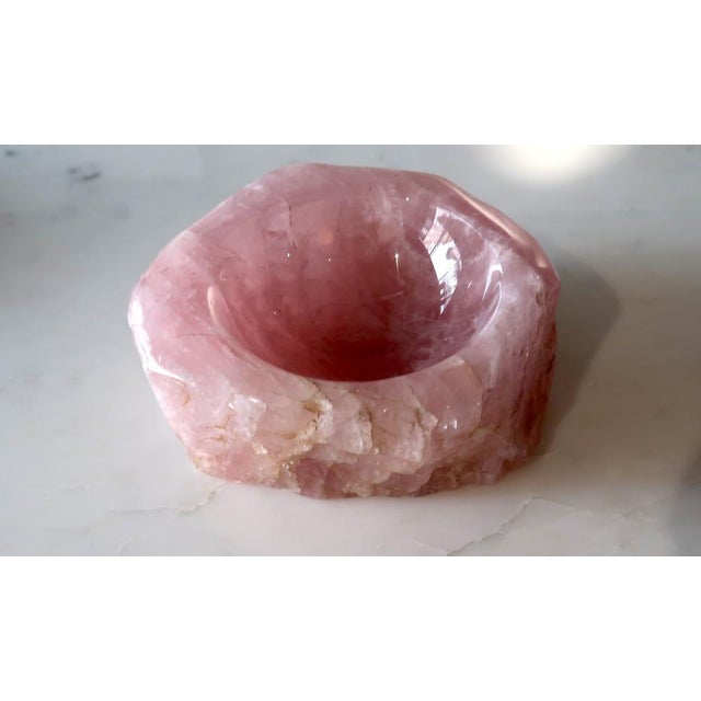 A bowls made of thoroughly processed Rose quartz.