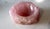 A bowls made of thoroughly processed Rose quartz.