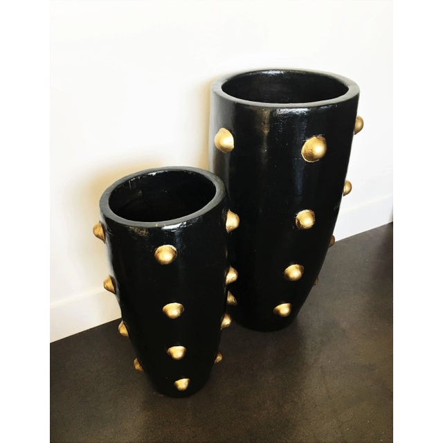 Pair one-of-a-kind ball pattern design sculpture planters. High fired glazed stoneware. Painted black and gold. These are...