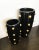 Pair one-of-a-kind ball pattern design sculpture planters. High fired glazed stoneware. Painted black and gold. These are...