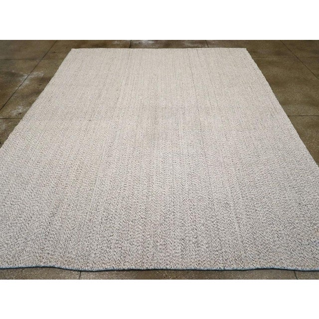 A vintage Turkish flatweave Kilim room size carpet handmade during the mid-20th century. Measures: 10' 4" x 12' 10".