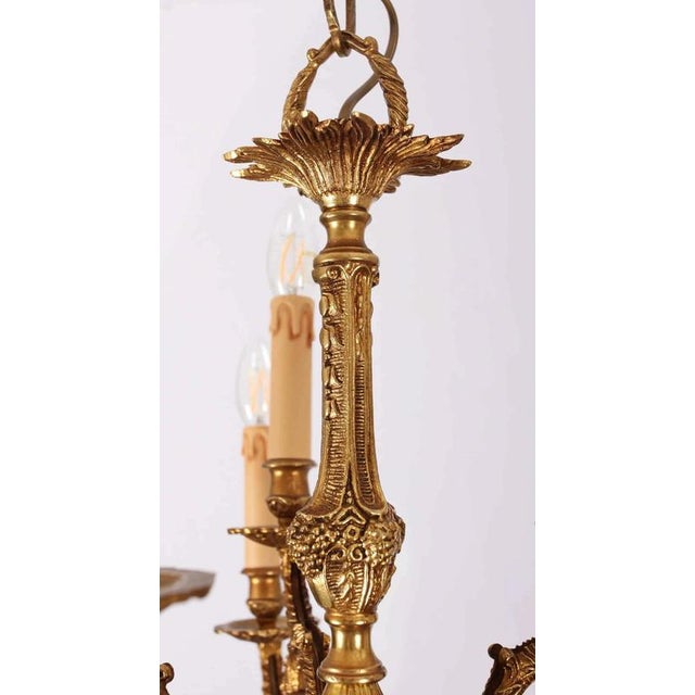 A beautiful chandelier that will brighten up even a larger room (depending on the selected bulbs). Restored electrical...
