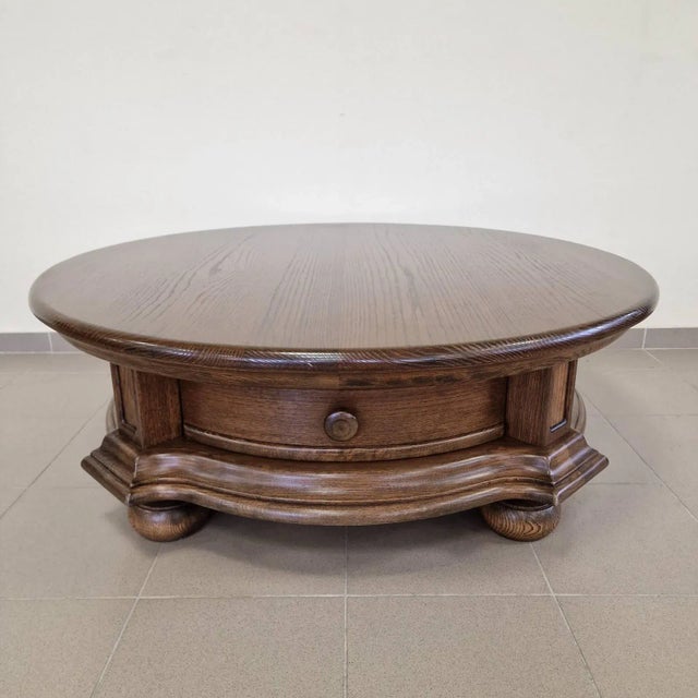 Solid living room oak table with a large drawer that slides on both sides.