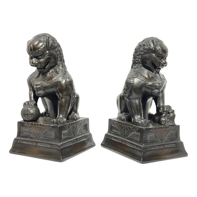 Vintage Patinated Metal Foo Lion Sculptures - A Pair For Sale