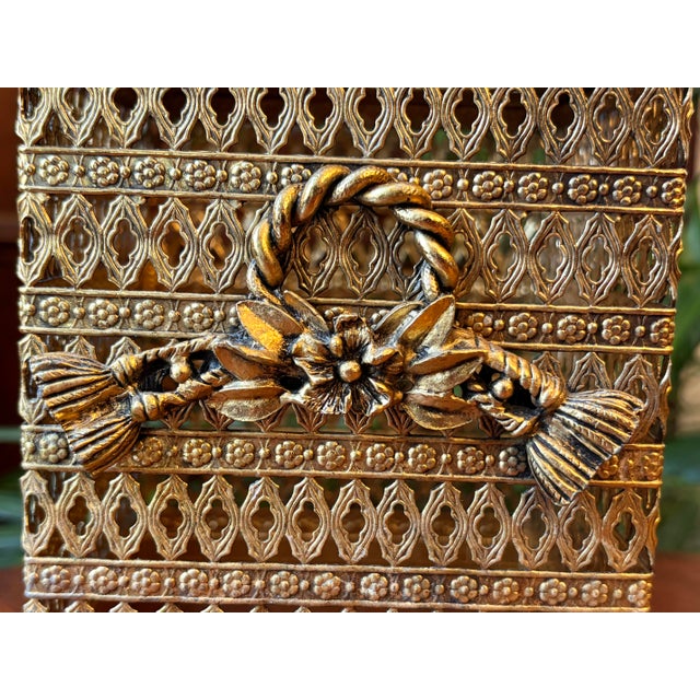 This Hollywood Regency gold tissue box cover adds a touch of old-world grandeur. An ideal accent piece for a bathroom,...