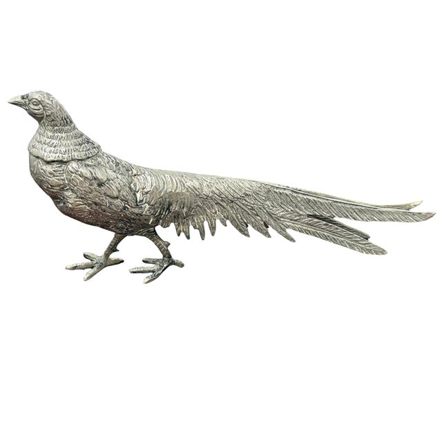 A striking vintage Gucci decorative pheasant figurine, made in Italy and rendered in richly detailed silver-tone metal....