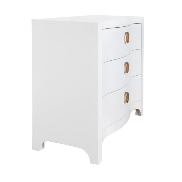 New special order item. Not vintage. Embrace coastal chic elegance with the Cora WH chest! This exquisite curved-front...