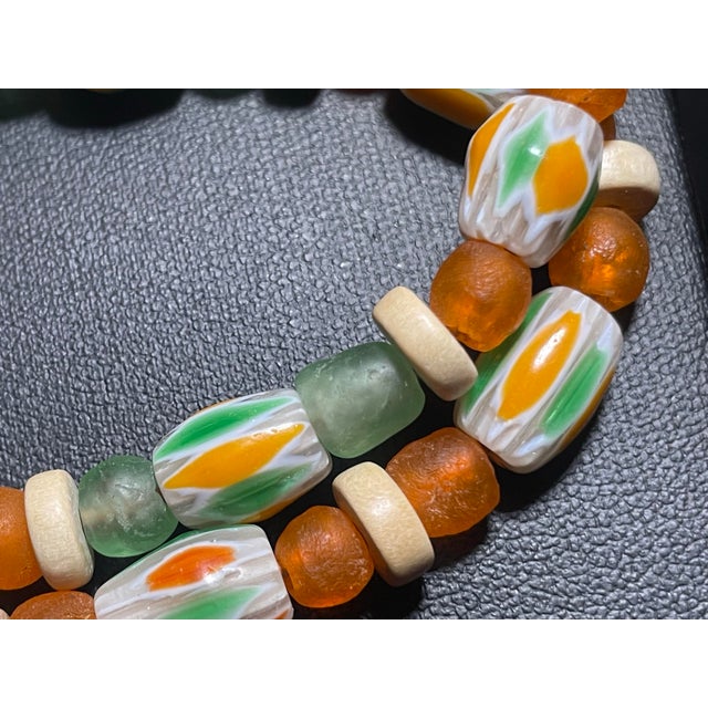 Crafted in the spirit of early 20th-century Venetian glassmaking, this striking necklace and bracelet set showcases...