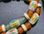 Crafted in the spirit of early 20th-century Venetian glassmaking, this striking necklace and bracelet set showcases...