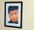 Framed unsigned pastel charcoal drawing young Asian boy. The drawing is used in excellent condition, Beautifully framed in...