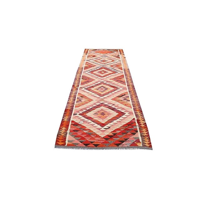 Colorful vintage handwoven Herki kilim runner. Approximately 45-55 years old. In very good condition.