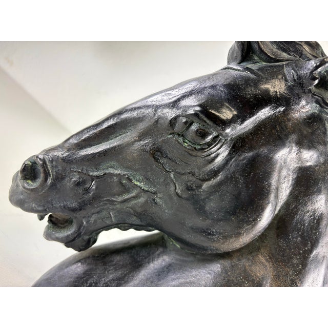 This is a mid-century vintage equestrian horse bust. This dynamic bust has a beautiful patinated bronze finished patina to...