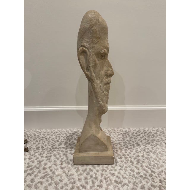 Striking studio-made mid-century plaster head sculpture signed A. Schor ’53. Strong modernist look with elongated...