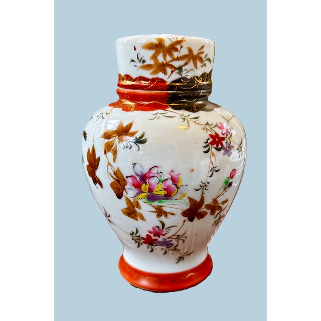 Mid-Century Japanese Kutani porcelain lidded ginger jar, beautifully hand-painted with an exquisite motif of birds in...