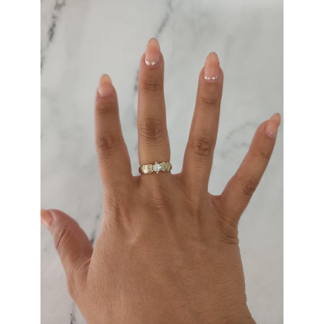 ♥ Product Summary ♥ Main Stone: Diamond Approx. Carat Weight: .50cttw Diamond Color: H Stone Cut: Round & Tapered Baguette...