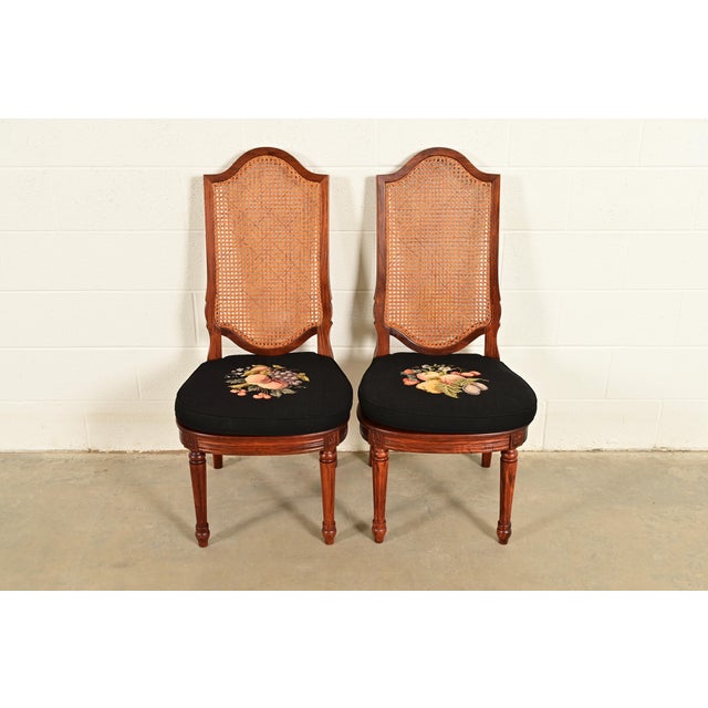 A gorgeous pair of French Regency Louis XVI style side chairs or dining chairs In the manner of Karges Furniture USA,...