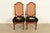 A gorgeous pair of French Regency Louis XVI style side chairs or dining chairs In the manner of Karges Furniture USA,...