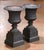 Pair of French cast iron garden urns on separate plinth bases, crafted circa 1870 in the Neoclassical style. Each urn...