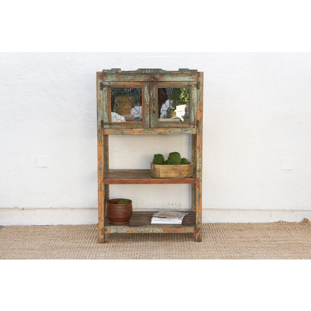 This handsome French Colonial étagère is a genuine antique, a charming fragment of history that effortlessly blends...