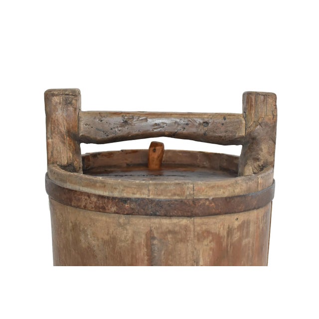 Last one! A solid jujube wood wine barrel from Northern China. Solid wood construction with thick heavy hand-forged iron...