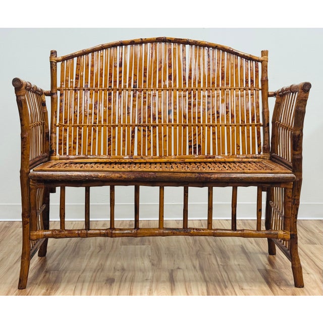 Stunning vintage scorched split reed bamboo bench settee. Substantial frame with prominent arms and split reed back and...