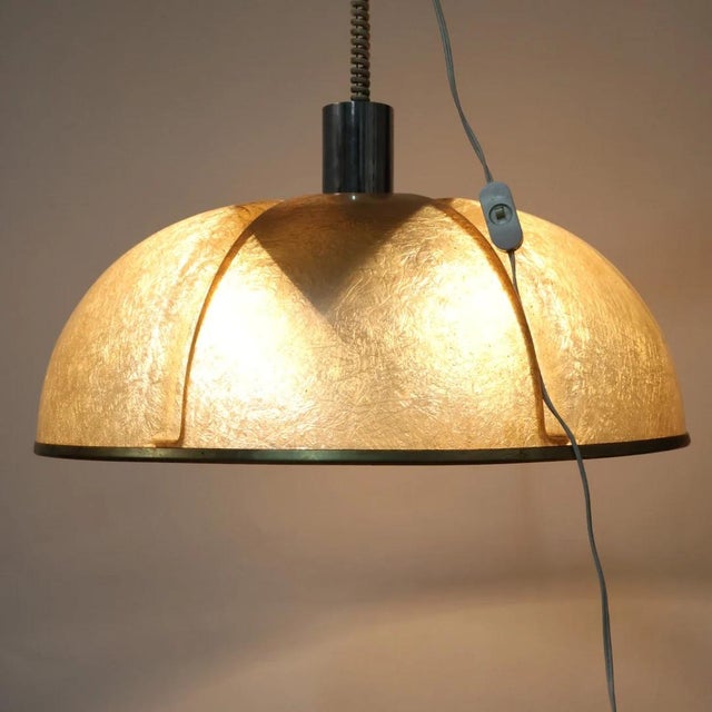 A splendid and rare original 1970s modernist pendant lamp (chandelier), model s447, produced by the renowned luci...