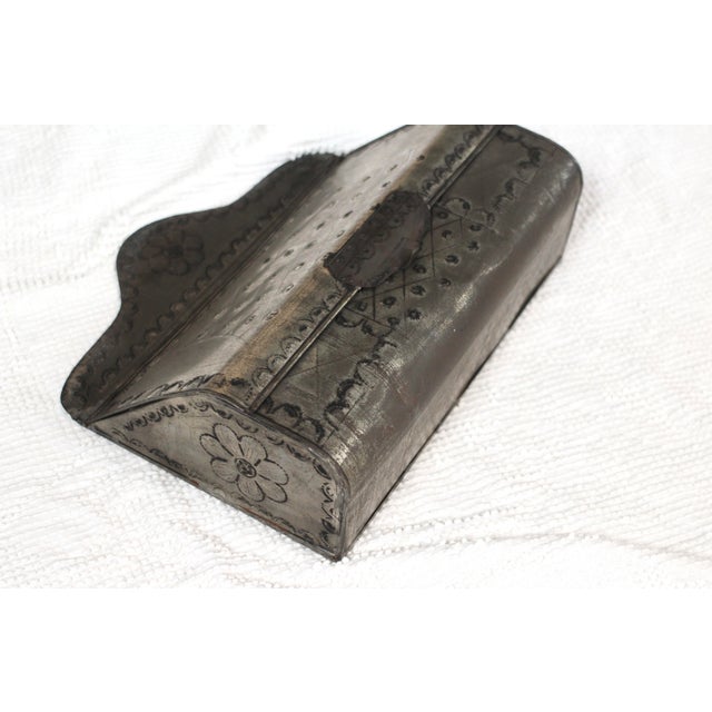 A unique mailbox made of lightweight punched and incised tin with great designs and details. Holes in the back for wall...