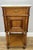 A characterful Antique French single bedside table, beautifully crafted in walnut and topped with an elegant marble...