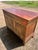 This elegant 19th-century French Louis Philippe commode is crafted from richly figured chestnut, showcasing a warm honey-...