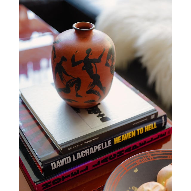 A hand-incised and hand-painted ceramic vase designed by Dietmar Liedke for Karlsruher Majolika in the 1970s. Graphic...