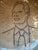 Fabulous Mid-Century studio pottery bowl featuring a man wearing a tie. Rays of light appear to be coming out of his eye...