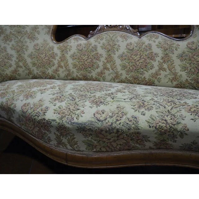 Sofa epoch end 800 in walnut wood with double headboard with floral fabric upholstery.