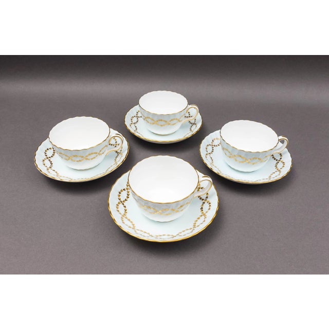 Minton England S600 Gold Laurel Leaves Light Blue Swirl Tea Cup & Saucer Set Of 4. Measures approximately Cup: 4 1/2"...