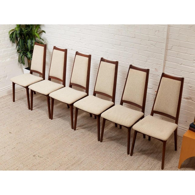With its modern profile, and stylish frame, this dining chair is sure to be an eye-catching piece for any style of...
