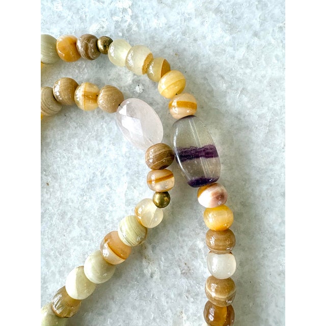 Lovely, vintage agate and mixed stones made into this lovely necklace design designed by Matthew Izzo